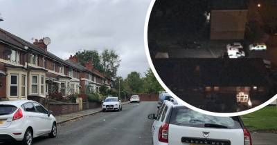 Man and woman in 60s rushed to hospital as police swarm 'quiet' Eccles street - www.manchestereveningnews.co.uk - Manchester