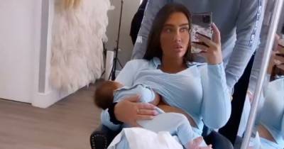 Lauren Goodger breastfeeds baby daughter Larose in salon during glam session - www.ok.co.uk