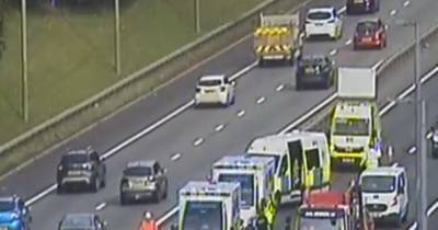 Two people rushed to hospital after three-car smash on busy Glasgow motorway - www.dailyrecord.co.uk
