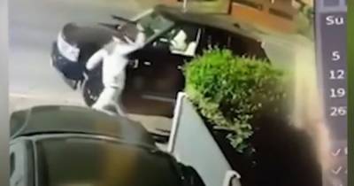 "It's just frightening": Shocking footage shows man hurling 'machete' at car wing mirrors on residential street - www.manchestereveningnews.co.uk - Manchester