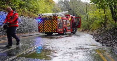 Two roads closed after torrential rain sees rivers burst banks - www.manchestereveningnews.co.uk - Manchester - county Oldham