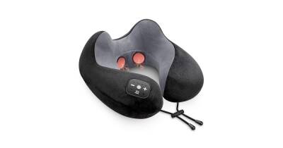 You’ll Never Want to Travel Again Without This Massaging Neck Pillow - www.usmagazine.com
