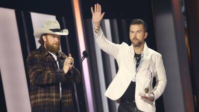 TJ Osborne Shares Sweet Moment With Partner as He Declares 'Love Wins Tonight' at CMA Awards - www.etonline.com - Tennessee