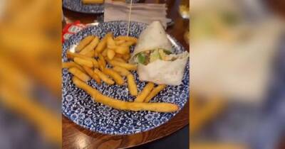 Student finds HUGE chip in Wetherspoons meal measuring more than a foot long - but is told he "should be ashamed" - www.manchestereveningnews.co.uk