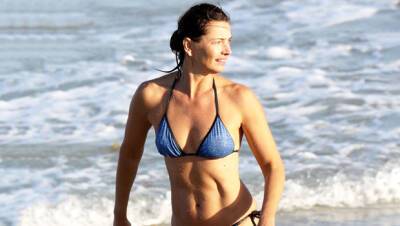 Paulina Porizkova, 56, Looks Sensational In Tiny White Bikini While ‘Pondering Life’ On Vacation - hollywoodlife.com