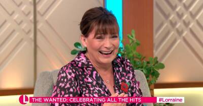 Lorraine Kelly embarrassed after top button pops open during The Wanted chat - www.ok.co.uk