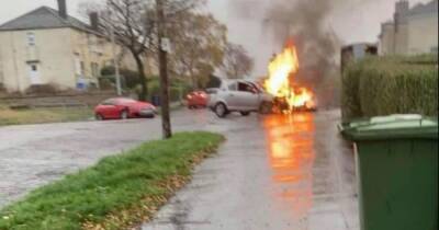 Car goes up in flames on Scots street following crash as two drivers rushed to hospital - www.dailyrecord.co.uk - Scotland