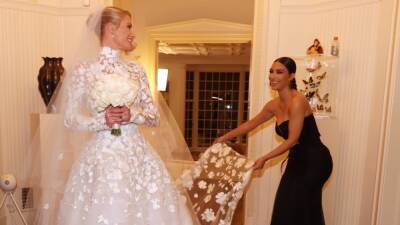 See Kim Kardashian Return to Her Stylist Roots at Pal Paris Hilton's Wedding - www.etonline.com - Los Angeles