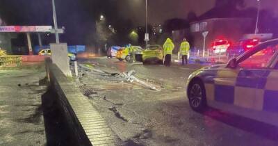 Driver flees scene after ploughing car into lamp post... his passenger was rushed to hospital - www.manchestereveningnews.co.uk
