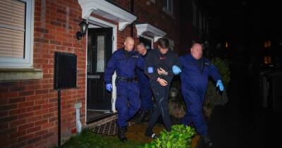 Stunned man arrested from his sofa after police storm homes in dawn raids - as drugs crackdown sees 200 detained - www.manchestereveningnews.co.uk