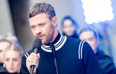 Will Young handcuffs himself to gates of dog-breeding centre - www.nme.com