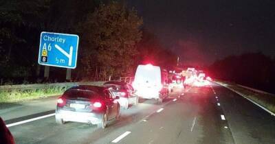 Man dies after being hit by car while walking on M61 fast lane - www.manchestereveningnews.co.uk