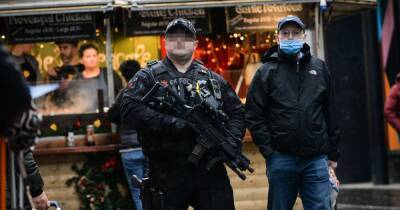 Armed police patrols increased as Christmas shoppers in Manchester are told to be 'extra vigilant' over terror threat - www.manchestereveningnews.co.uk - Britain - Manchester