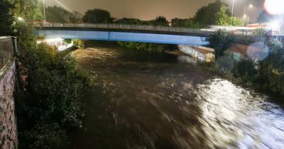The flood alerts in force across Greater Manchester - as cars 'abandoned' on road under water in Salford - www.manchestereveningnews.co.uk - Manchester - county Lane