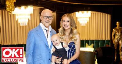 Billionaire John Caudwell and partner Modesta Vzesniauskaite introduce seven month old son William - www.ok.co.uk