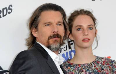Maya Hawke says parents Ethan Hawke and Uma Thurman tried to “protect” her from acting - www.nme.com