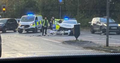 Police car left heavily damaged after crash on main road - www.manchestereveningnews.co.uk