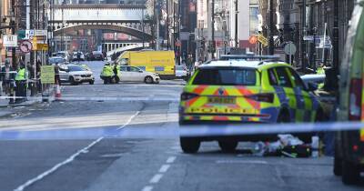 Two teenagers arrested on suspicion of murder after man dies in city centre 'fail to stop collision' - www.manchestereveningnews.co.uk - Manchester
