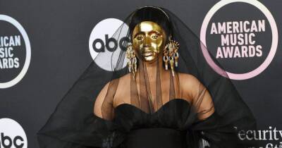 Cardi B Wore a Gold Face Mask and Fingernail Earrings to the 2021 AMAs — and the Internet Has Thoughts - www.usmagazine.com - USA
