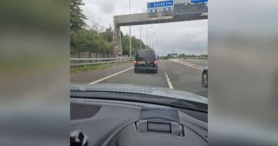 Terror after maniac driver 'tried to ram man off M60' before reversing at him in fast lane road rage - www.manchestereveningnews.co.uk