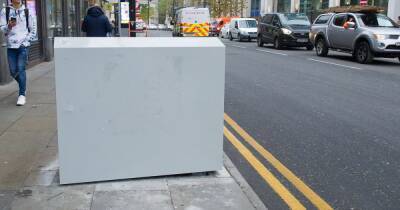 'F*** you pedestrians': Sweary posters appear on big, grey boxes that are driving people mad in city centre - www.manchestereveningnews.co.uk - Manchester