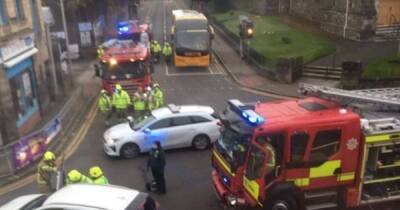 Two injured after fire engine on emergency call crashes with car on Scots road - www.dailyrecord.co.uk - Scotland - Beyond