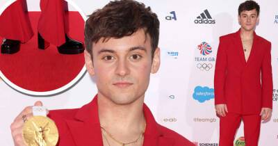 Tom Daley goes shirtless in red suit and platforms at Team GB ball - www.msn.com - London