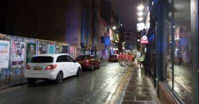 Northern Quarter road closed after Storm Arwen winds blow wooden boards from derelict building onto parked cars - www.manchestereveningnews.co.uk - Britain - Manchester