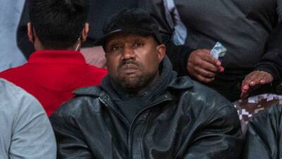 Kim Kardashian - Kanye West Looks Sad At Basketball Game After Posting Kiss Photo With Kim Kardashian - hollywoodlife.com - county Kings - Sacramento, county Kings