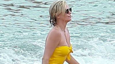 Charlize Theron stuns in yellow one-piece while being a responsible mom on vacation in Mexico - www.foxnews.com - USA - Mexico