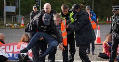 Insulate Britain protesters who glued their hands to the road near Manchester Airport bailed - www.manchestereveningnews.co.uk - Britain - Manchester - county Hale