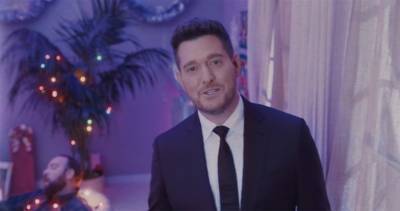 Michael Buble unveils festive video for It's Beginning To Look A Lot Like Christmas - www.officialcharts.com - Britain