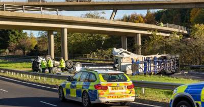Horror images show M90 crash aftermath as lorry falls off flyover - www.dailyrecord.co.uk