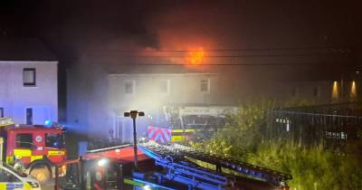 Watch as massive flames leap from Glasgow house as emergency services race to scene - www.dailyrecord.co.uk