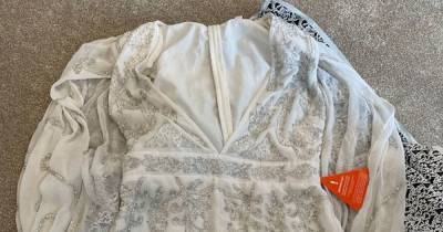 Bride-to-be 'traumatised' after ASOS outfit arrives with 'disgusting bloodstain' - www.dailyrecord.co.uk - Manchester