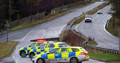 Two rushed to hospital after car crashes into wall off A80 road - www.dailyrecord.co.uk - Scotland