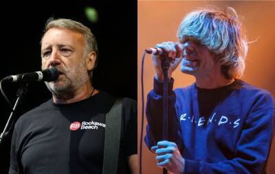 Tim Burgess and Peter Hook criticise venues that take a cut of merch sales - www.nme.com