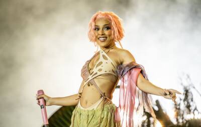 Doja Cat tests positive for COVID-19, pulls out of iHeartRadio Jingle Ball Tour - www.nme.com