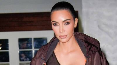 Kim Kardashian Passes the Baby Bar Exam: 'Don't Ever Give Up When You're Holding On By a Thread' - www.etonline.com