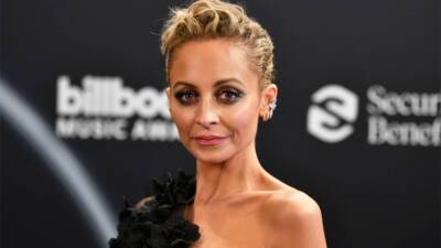 Nicole Richie stuns in golden gown for glamorous solo holiday shoot: 'My family forgot' - www.foxnews.com