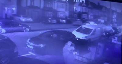 Family baffled by bizarre CCTV footage of woman walking off with their CAT in dead of night - www.manchestereveningnews.co.uk - county Douglas