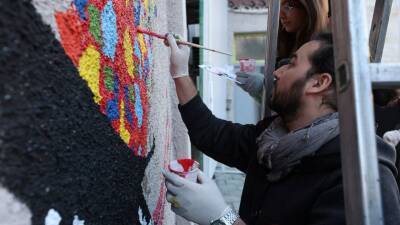 Evacuated Afghan artists paint a mural in Albania's capital - abcnews.go.com - Afghanistan - Albania
