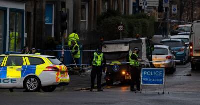 Man rushed to hospital as blood-splattered windows seen at Edinburgh property - www.dailyrecord.co.uk