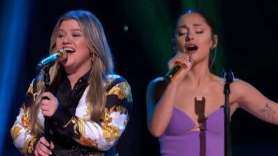 Kelly Clarkson and Ariana Grande Talk Performing 'Santa, Can't You Hear Me' For the First Time - www.etonline.com - Santa
