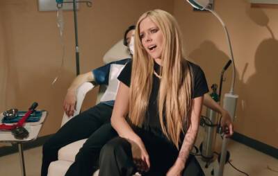 Avril Lavigne shares stirring acoustic version of ‘Bite Me’ - www.nme.com - Minnesota