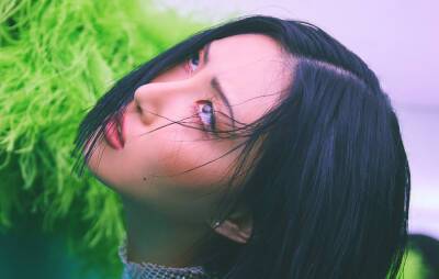 MAMAMOO’s Hwasa dresses up as the Grinch for her cover of ‘Jingle Bell Rock’ - www.nme.com - county Rock - county Bell