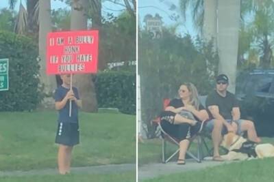 Parents spark debate after making son hold ‘I am a bully’ sign on busy road - nypost.com