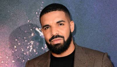 Drake Shares Adorable Christmas Eve Video with His Son Adonis - www.justjared.com