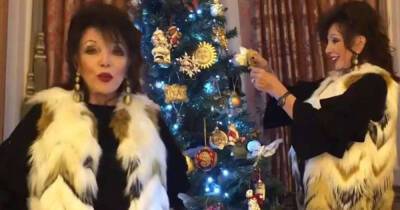Joan Collins' fans accuse her of wearing real fur in Christmas video - www.msn.com