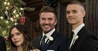 David Beckham - Christmas - David Beckham fans in hysterics as he stands on his tip toes in Christmas snap - ok.co.uk
